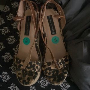 Size eight cheetah wedges